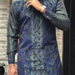 Traditional Male Adire Dress Style with indigo and white hand-dyed patterns