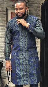 Traditional Male Adire Dress Style with indigo and white hand-dyed patterns