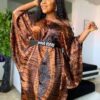 Elegant off-shoulder Ankara dress with vibrant print and modern cut"